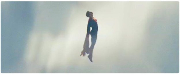 man of steel flying upward